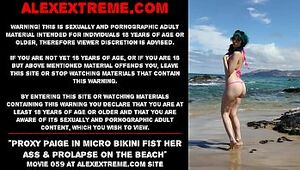 Proxy Paige in micro bathing suit knuckle her backside & ass inside-out on the beach