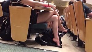 Cams4free.net - College girl's legs and feet during the class