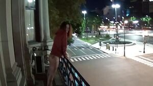 Outdoor public urinating from a balcony in America